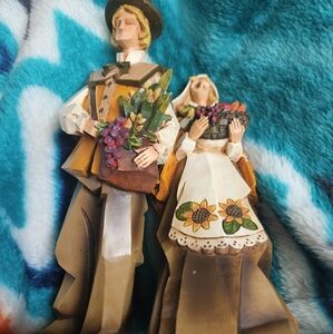 Wooden Figurines with Floral Accents